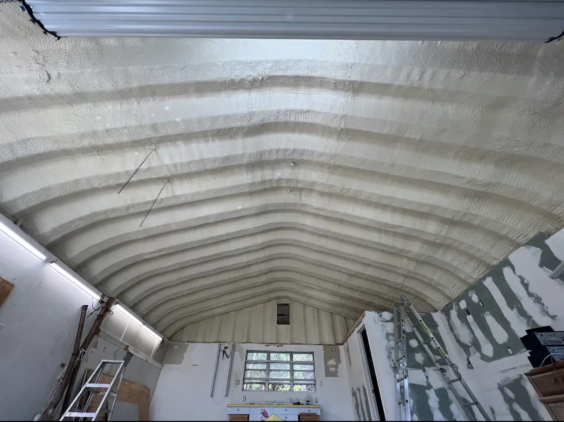 Spray polyurethane foam applied to the underside of a metal roof deck in Winter Gardens